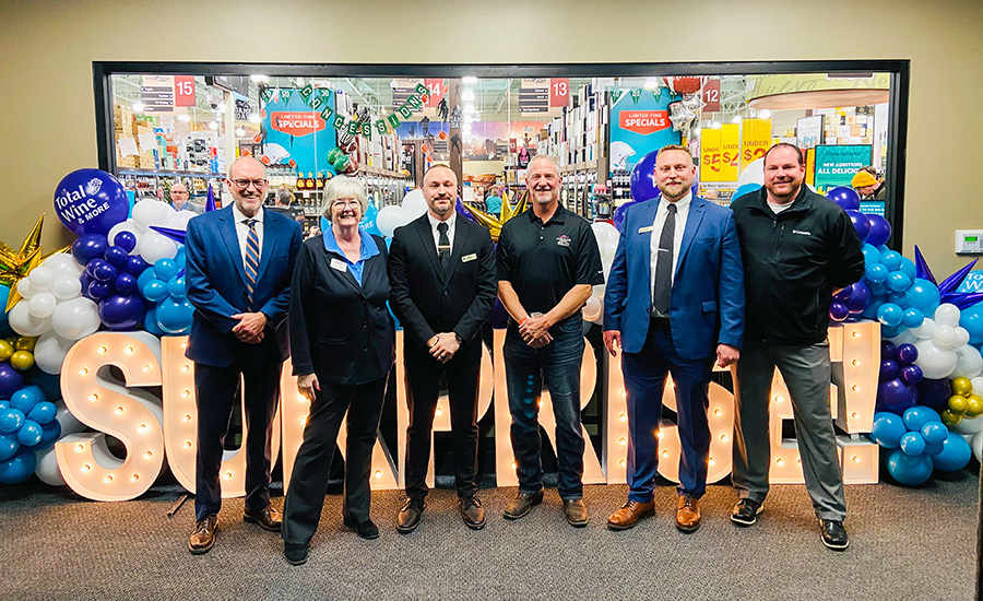 Vice Mayor Judd, Councilmember Cline and Councilmember Duffy pose for a picture with the leadership team at Total Wine and More, Surprise.