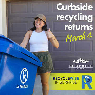 a person pulling a blue recycle bin and posing with a thumbs up. Curbside recycling returns March 4. Recycle Wise in Surprise.