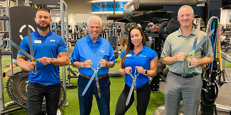 Mayor Hall and Vice Mayor Judd pose for photo at EOS Fitness with Regional Vice President of Operations, Katy O'Neil, and Regional Vice President of Fitness, Sean Cooper.