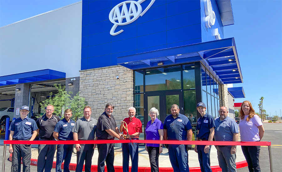 Mayor Hall and City Councilmembers pose for a photo with AAA Mountain West Group Surprise for a ribbon cutting event.