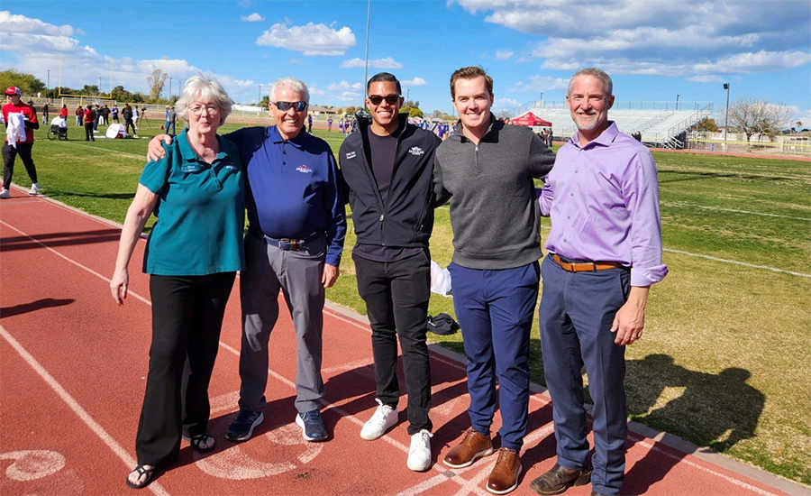 Mayor Hall, Vice Mayor Judd and Councilmembers Cline, Haney and Hastings pose for a picture on the track at Valley Vista High School.